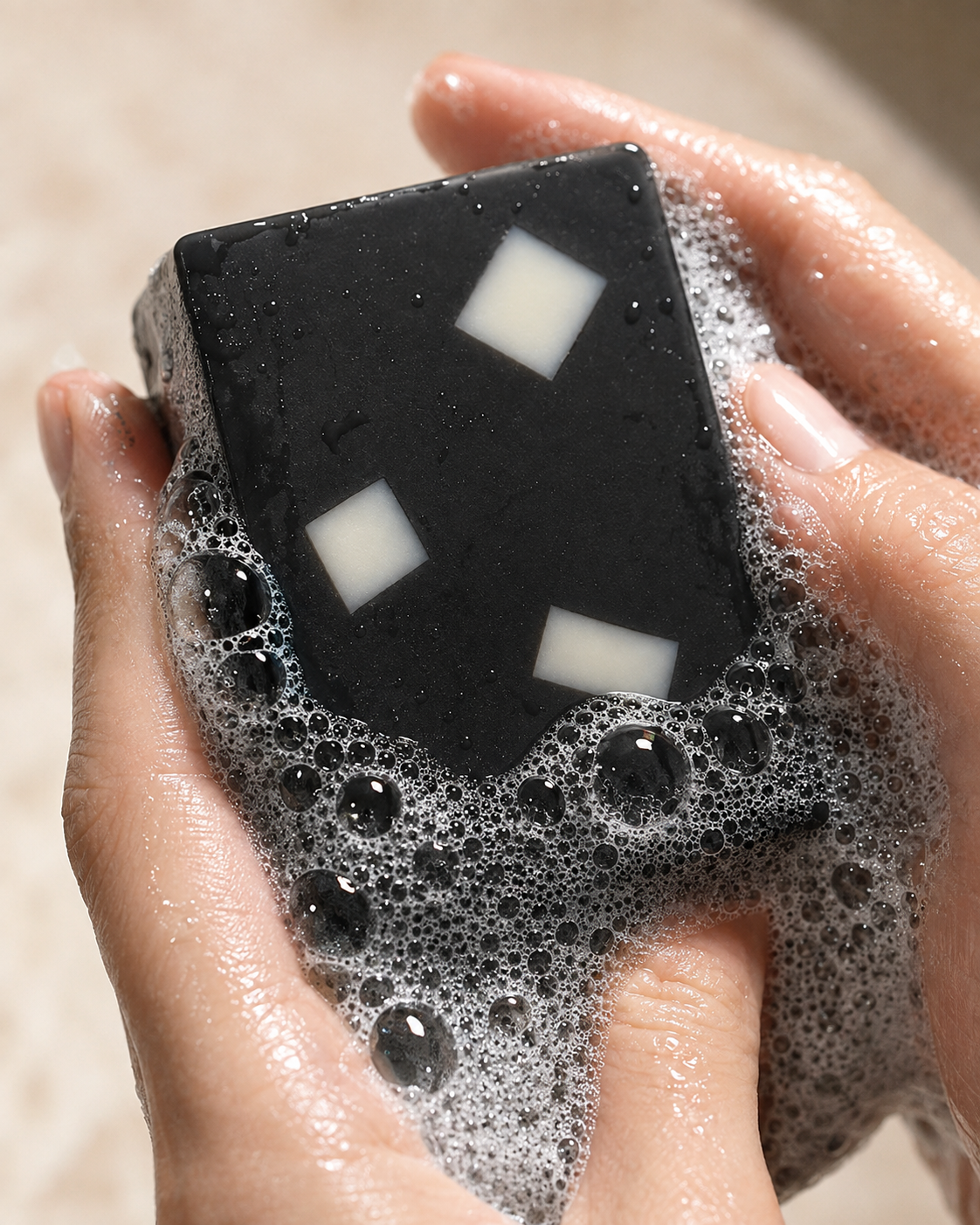 Charcoal Aloe — bar worked into a full lather in cupped hands